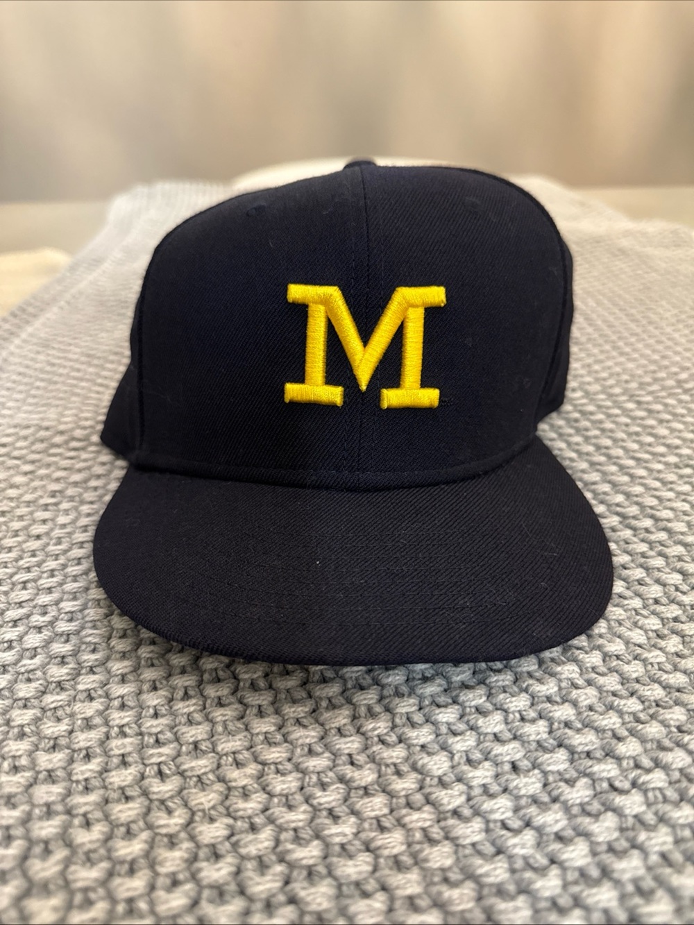 Jordan Navy Snapback Hat with Yellow 'M' Embroidery